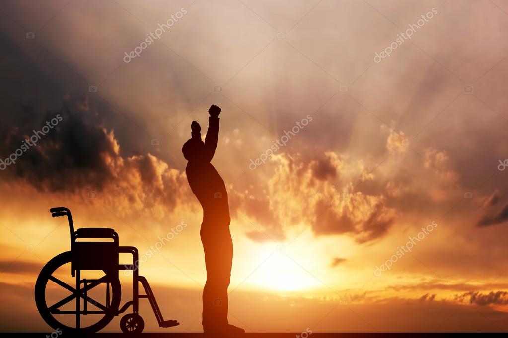 Man standing up from wheelchair. Stock Photo by ©Photocreo 68399769