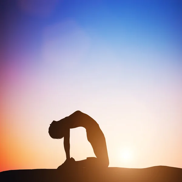 Woman in camel yoga pose — Stock Photo, Image