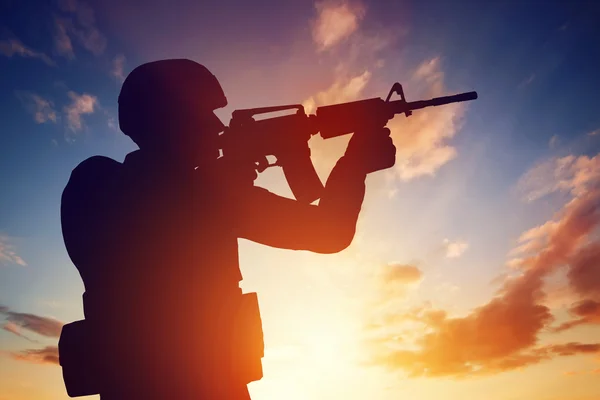 Soldier shooting with his rifle — Stock Photo, Image