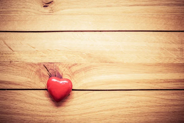 Red little heart on wood — Stock Photo, Image