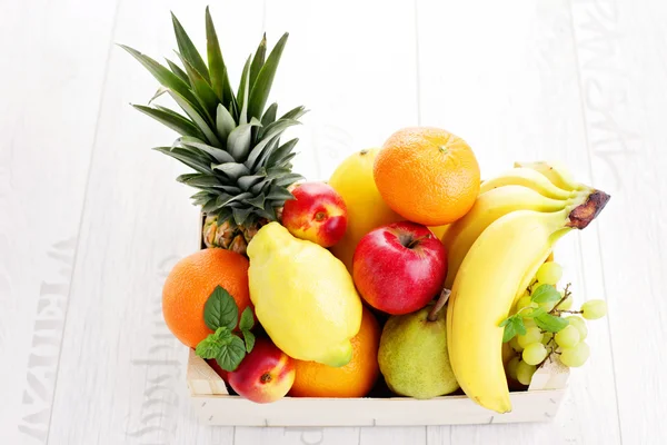 Box full of fresh fruits — Stock Photo, Image