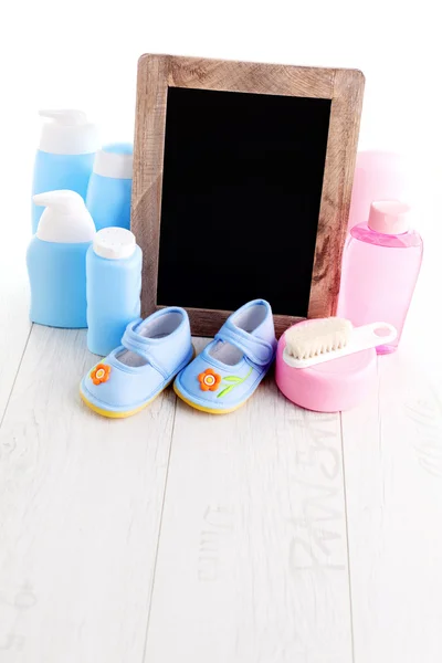 Baby stuff - frame en flessen — Stockfoto