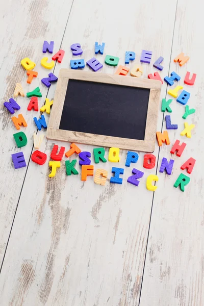 Wooden alphabet blocks as a frame — Stock Photo, Image