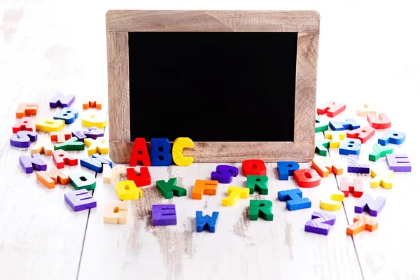 Wooden alphabet blocks as a frame — Stock Photo, Image