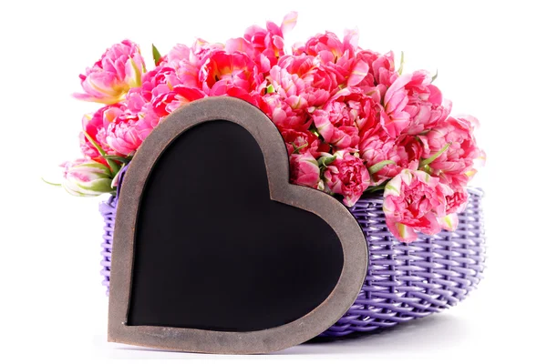 Lots of pink tulips with heart — Stock Photo, Image