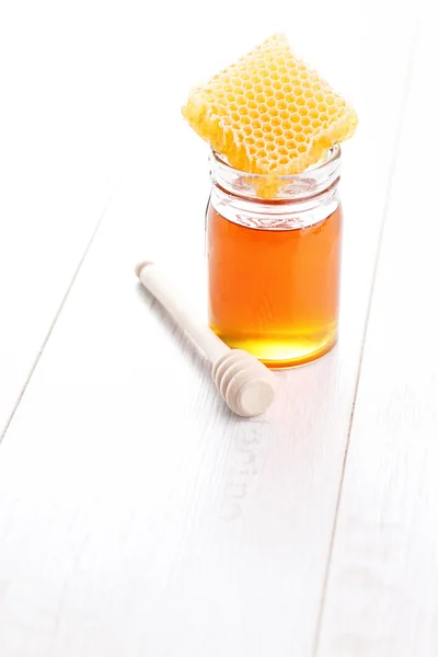 Honey with honey comb — Stock Photo, Image