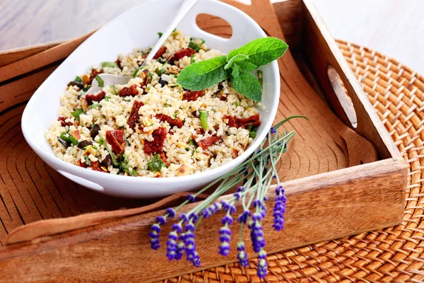 Bowl of bulgur salad  with dry tomato — Zdjęcie stockowe