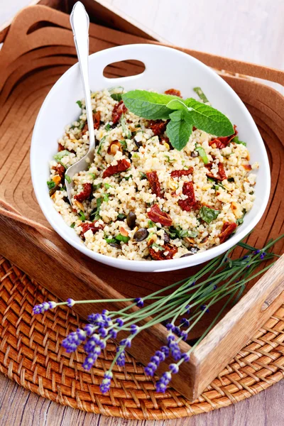 Bowl of bulgur salad  with dry tomato — Zdjęcie stockowe