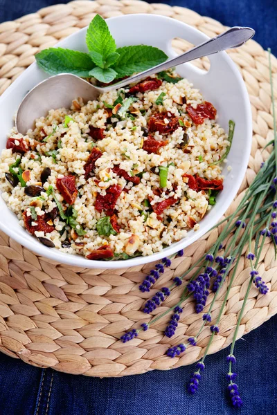 Bowl of bulgur salad  with dry tomato — Zdjęcie stockowe