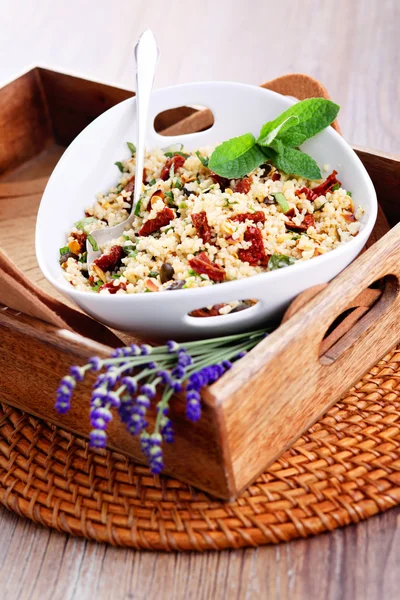 Bowl of bulgur salad  with dry tomato — Zdjęcie stockowe