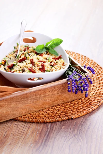 Bowl of bulgur salad  with dry tomato — Zdjęcie stockowe