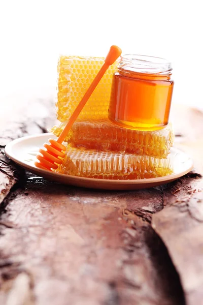 Honey with honeycomb — Stock Photo, Image