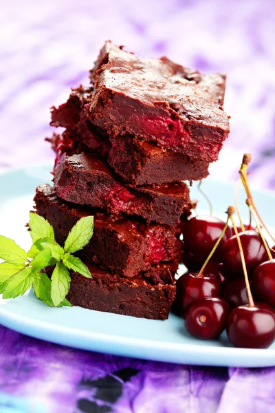 Stack of brownie with cherries — Stock Photo, Image