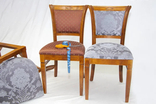 Vintage furniture: restoration of old chairs, replacement of upholstery.