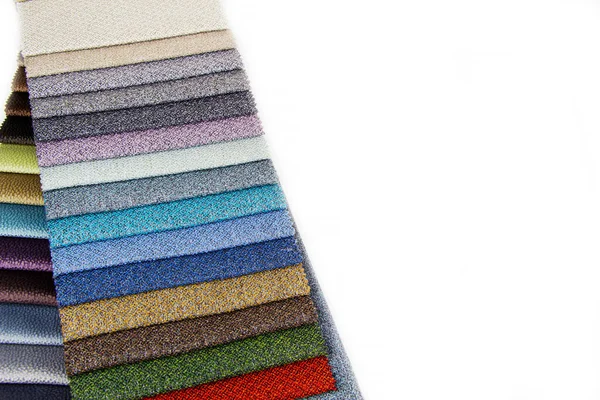 Zestaw próbek tkanin do wykończenia mebli. Kolorowe paski tapicerskie. — Zdjęcie stockowe