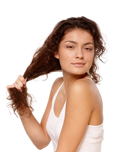 Girl plays with hair — Stock Photo, Image