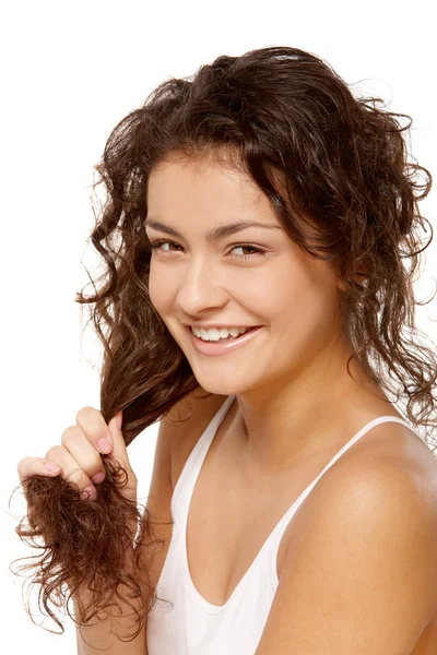 Girl plays with hair — Stock Photo, Image