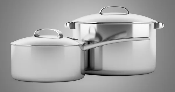 Två matlagning kokkärl isolerade på grå bakgrund — Stockfoto