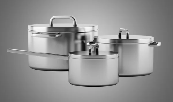 Three cooking pans isolated on gray background — Stock Photo, Image