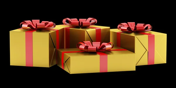 Yellow gift boxes with red ribbons isolated on black background — Stock Photo, Image