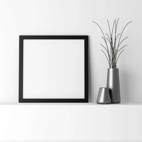 Blank black photo frame on white shelf — Stock Photo, Image