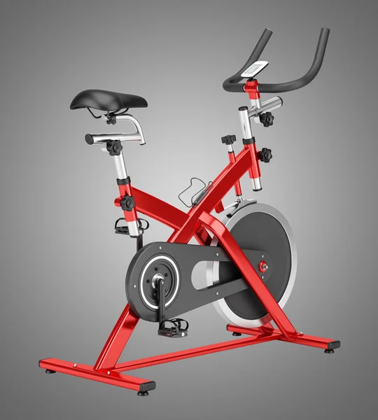 stationary exercise bike isolated on gray background