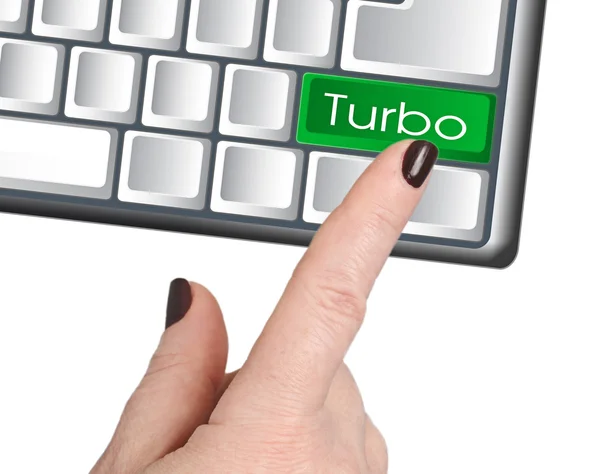Рука нажимает кнопку TURBO — стоковое фото
