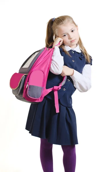 The schoolgirl holds a schoolbag in hand — Stock Photo, Image