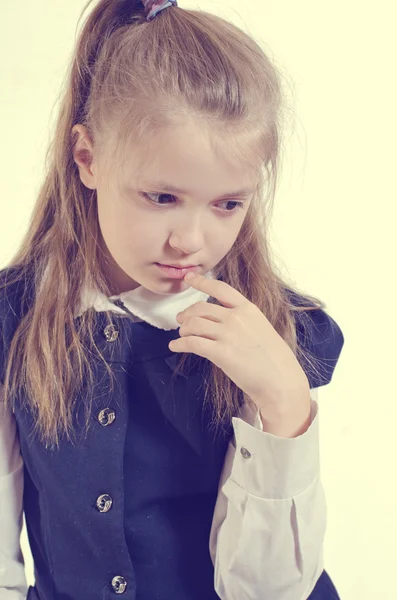 The schoolgirl with a thoughtful air — Stock Photo, Image