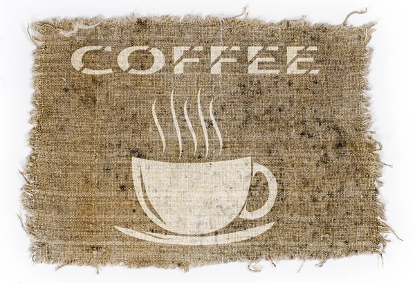 Old burlap on a white background with a picture of a Cup and the — Stock Photo, Image