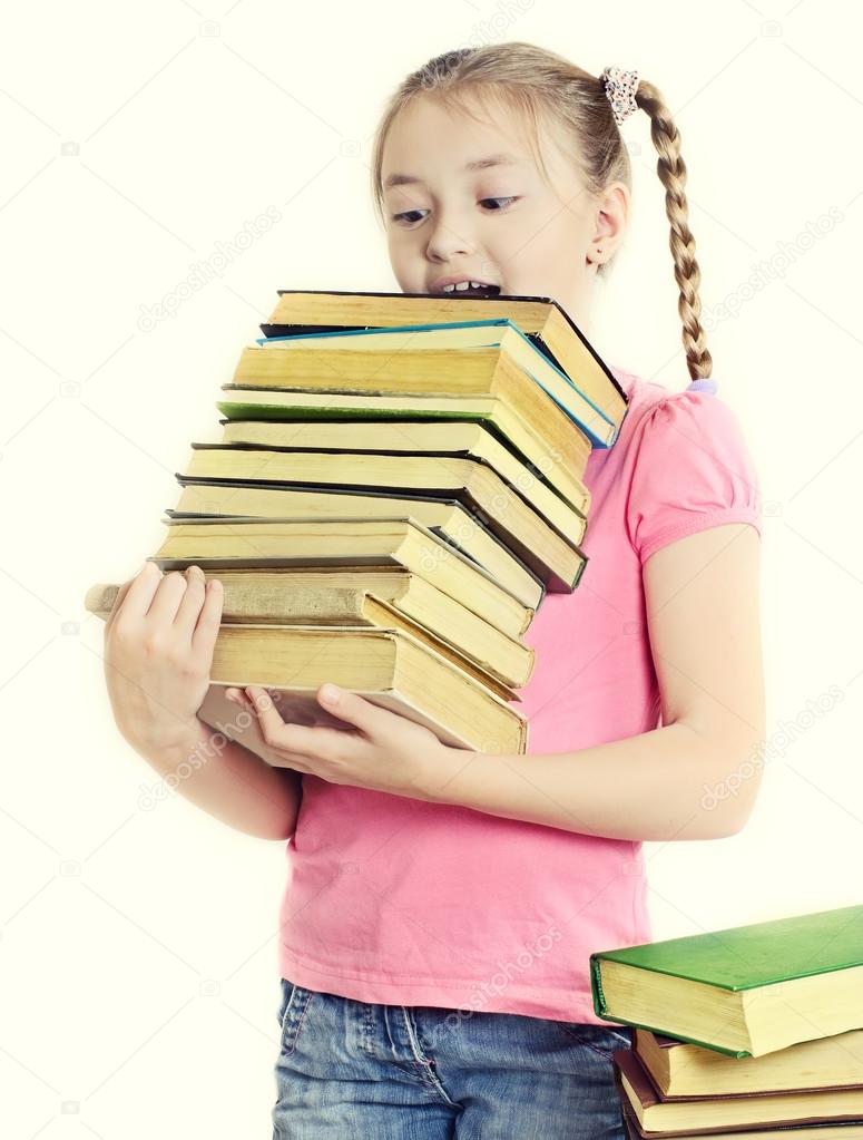 girl holding many books