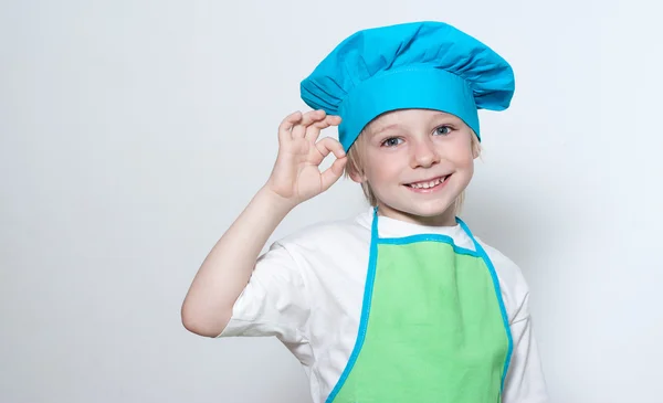 Criança como cozinheiro chef — Fotografia de Stock