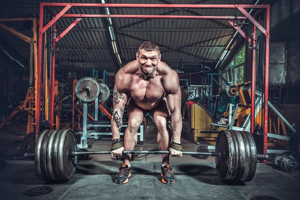 Powerlifter emelő súlyok — Stock Fotó