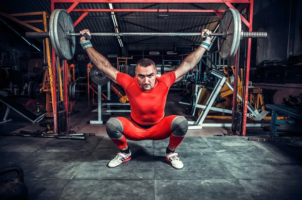 Powerlifter emelő súlyok — Stock Fotó