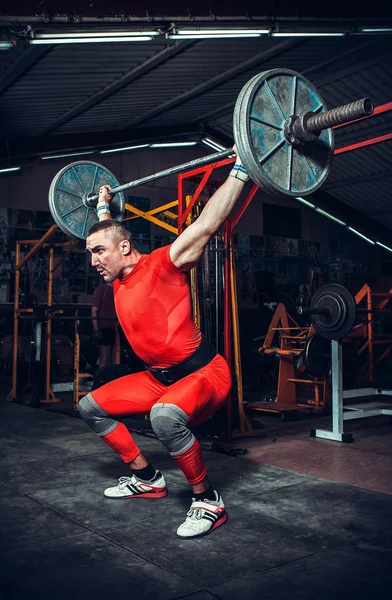 Powerlifter emelő súlyok — Stock Fotó