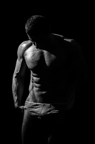 Muskulöser gutaussehender athletischer Mann — Stockfoto