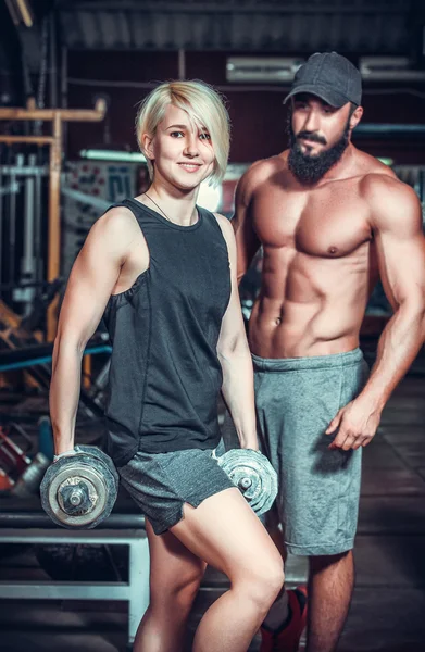 Couple of well trained bodybuilders — Stock Photo, Image