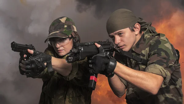 Portrait of soldiers up in arms — Stock Photo, Image