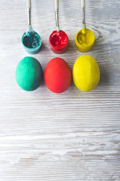 Easter eggs and paints — Stock Photo, Image