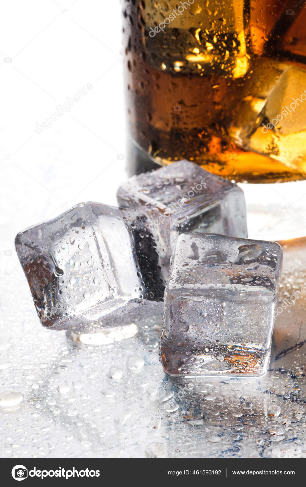 Ice Cubes Melt Glass Table Rippled Glass Bourbon Stock Photo by ©kosoff