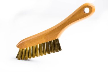 Küçük bir bakır fırça. Evde ve bir çilingir atölyesinde kullanılan aksesuarlar.