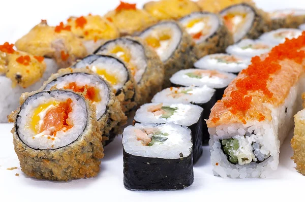 Sushi e rolos — Fotografia de Stock