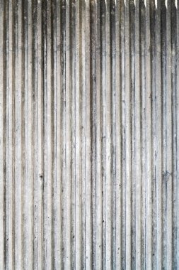 Doku ve doğrusal mimari detay içeren soyut beton duvar arkaplanı