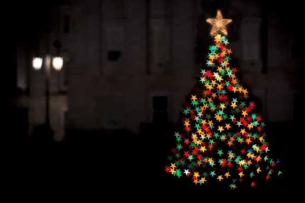 Árvore de Natal iluminada Fotos De Bancos De Imagens