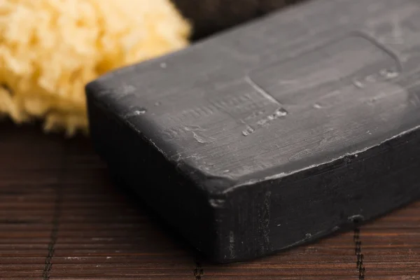 Block of natural carbon soap — Stock Photo, Image