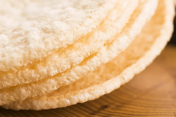 Light wheat crispers on wooden background — Stock Photo, Image