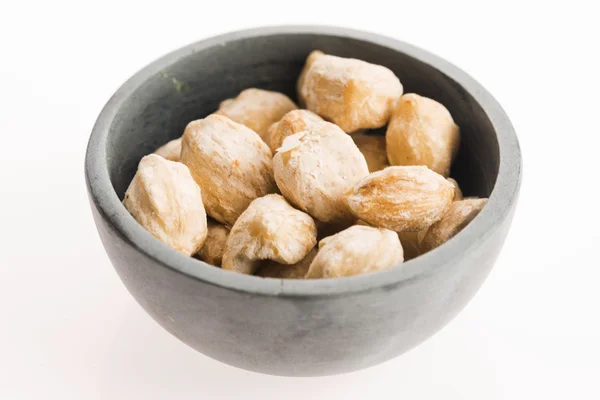 Candlenut or Kukui is a spice especially used in indonesian cook — Stock Photo, Image