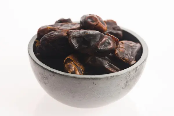 Dried dates fruit in a bowl — Stock Photo, Image