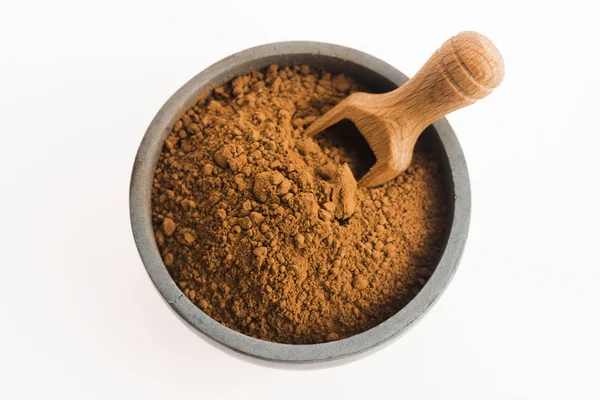 Carob powder on white — Stock Photo, Image