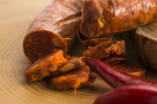 Spanish traditional chorizo sausage, with fresh herbs — Stock Photo, Image